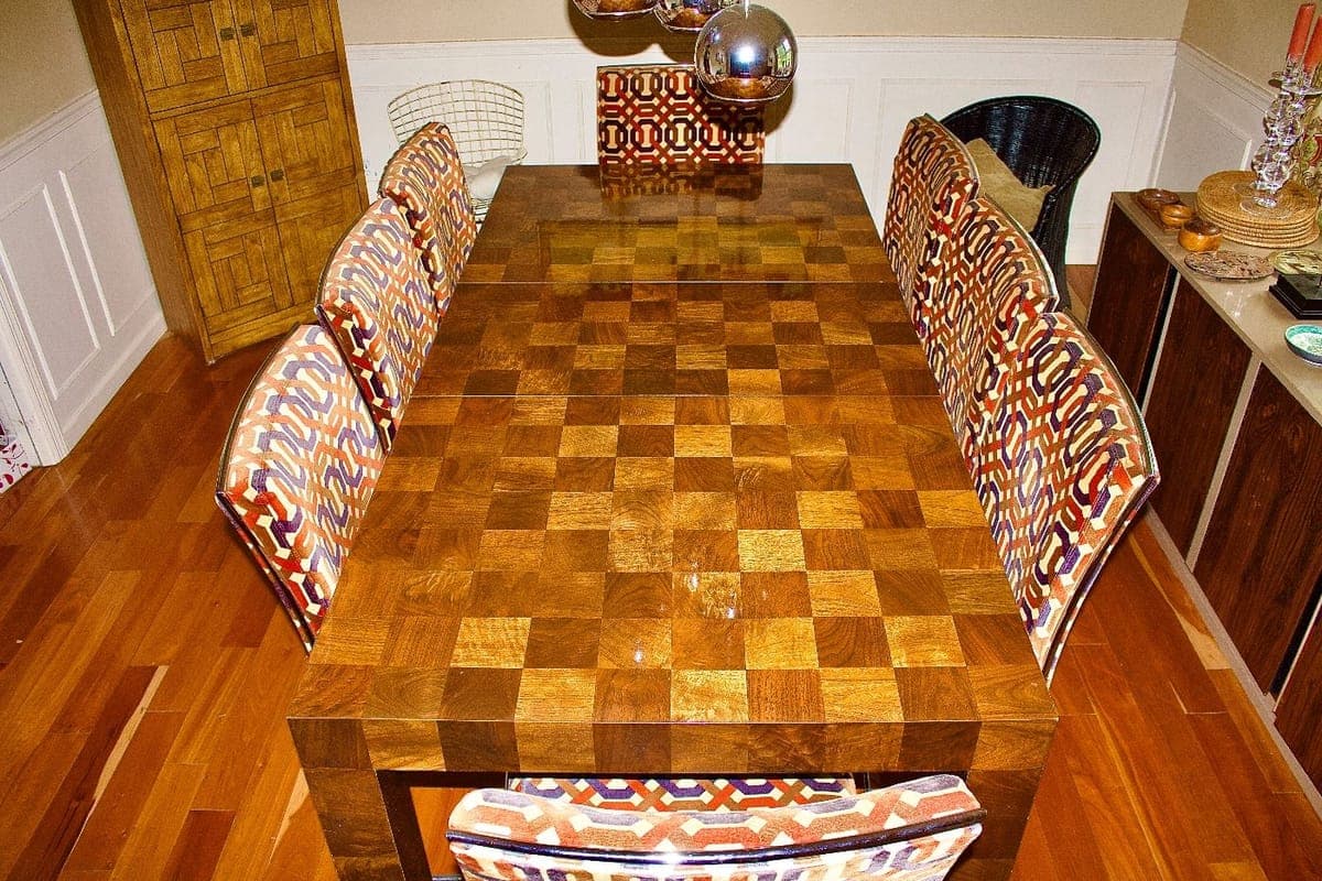 Dining table and chairs staged and tagged for a Black Dog on-site estate sale